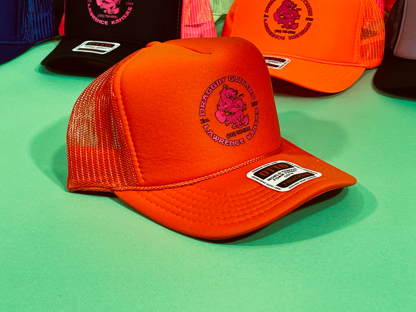 Draggin' Guitars Snap-Back Retro 1970's Trucker Hat Orange with Hot Pink Print