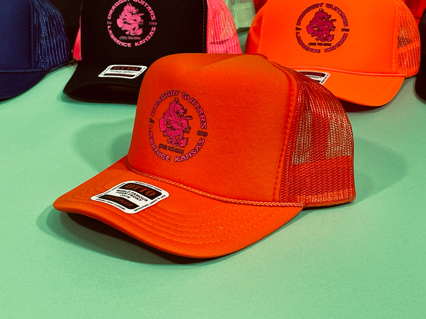 Draggin' Guitars Snap-Back Retro 1970's Trucker Hat Orange with Hot Pink Print