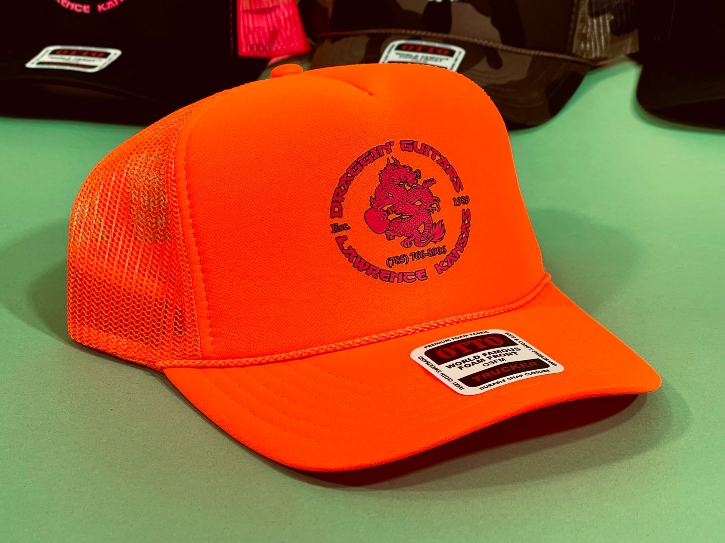 Draggin' Guitars Snap-Back Retro 1970's Trucker Hat Neon Orange with Hot Pink Print