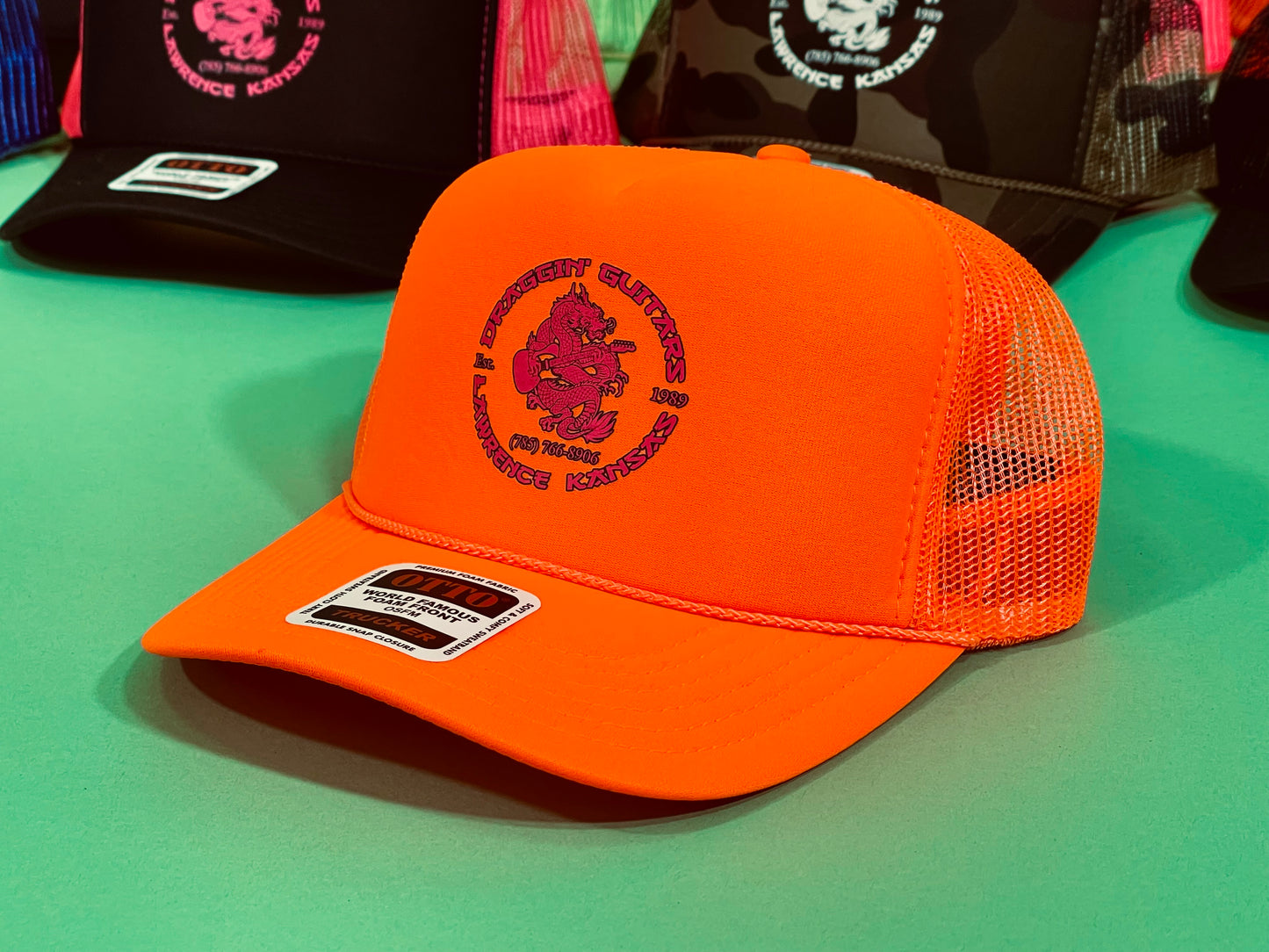 Draggin' Guitars Snap-Back Retro 1970's Trucker Hat Neon Orange with Hot Pink Print