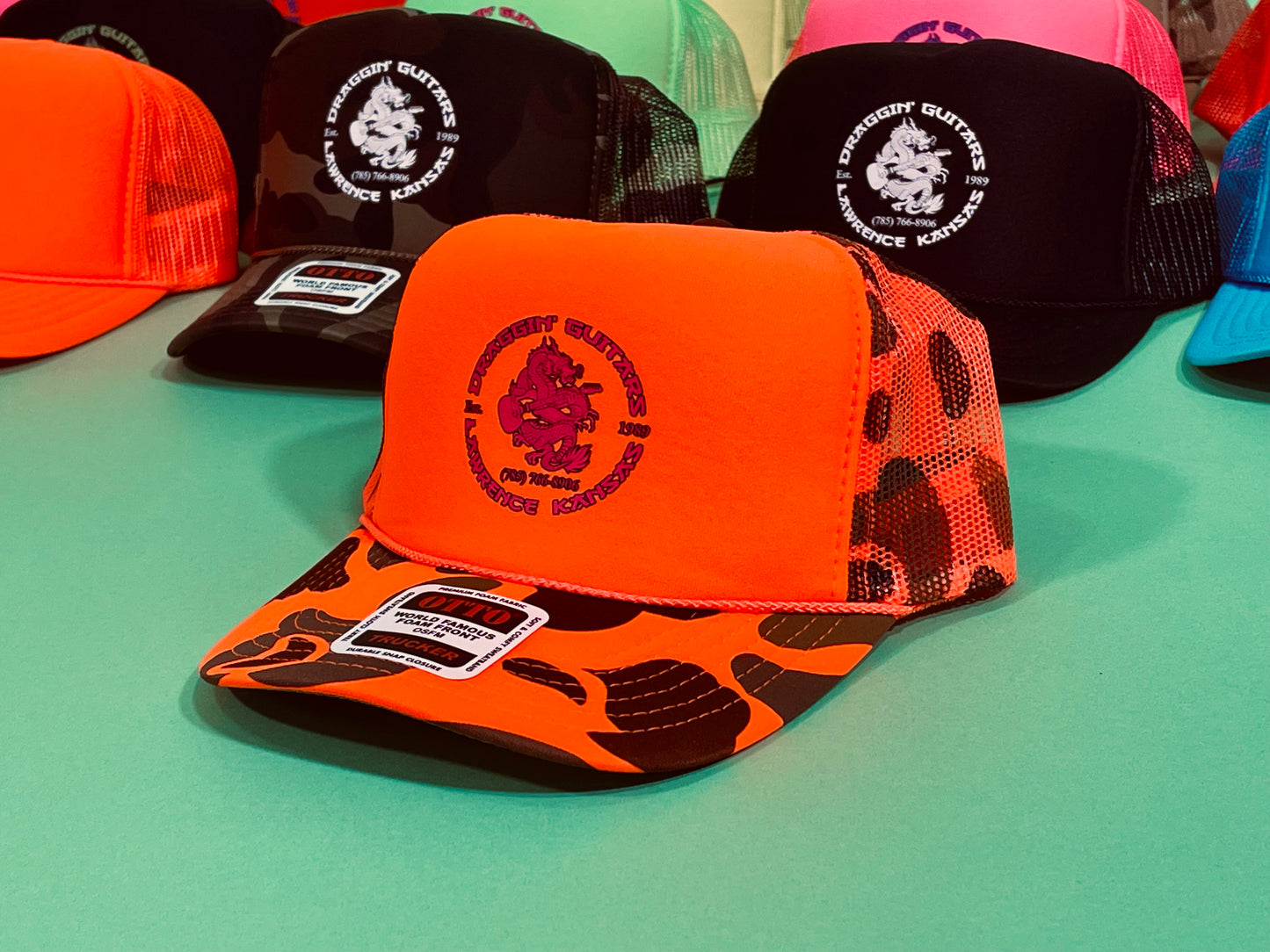 Draggin' Guitars Snap-Back Retro 1970's Trucker Hat NEON Orange CAMO with Hot Pink Print