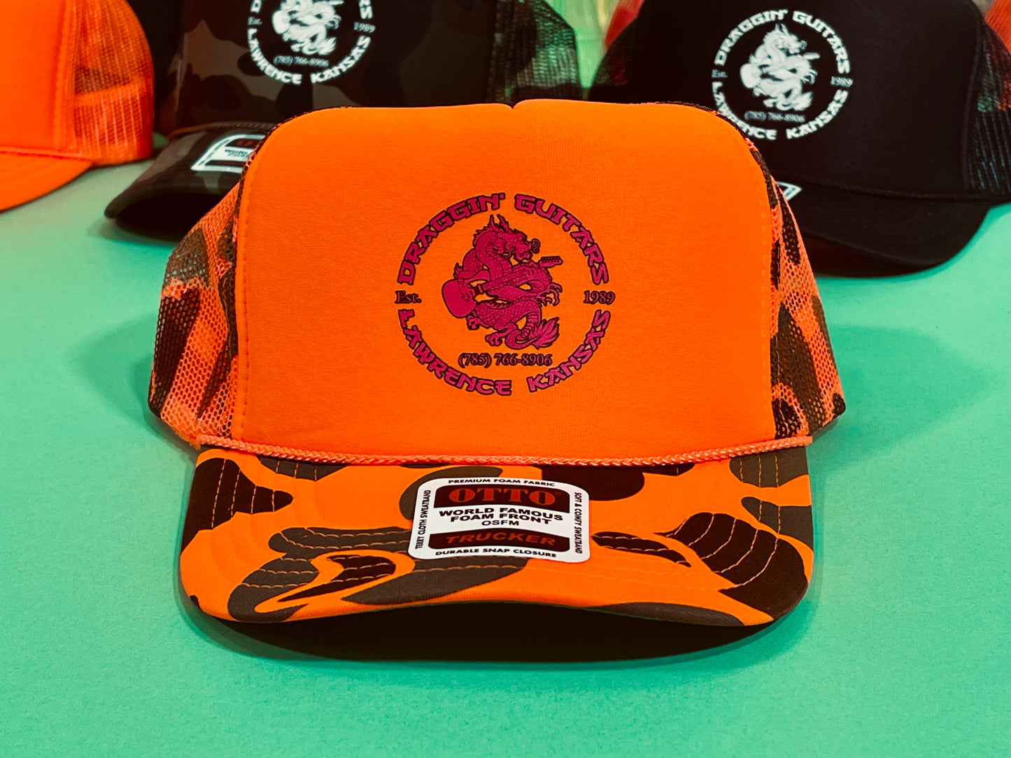 Draggin' Guitars Snap-Back Retro 1970's Trucker Hat NEON Orange CAMO with Hot Pink Print